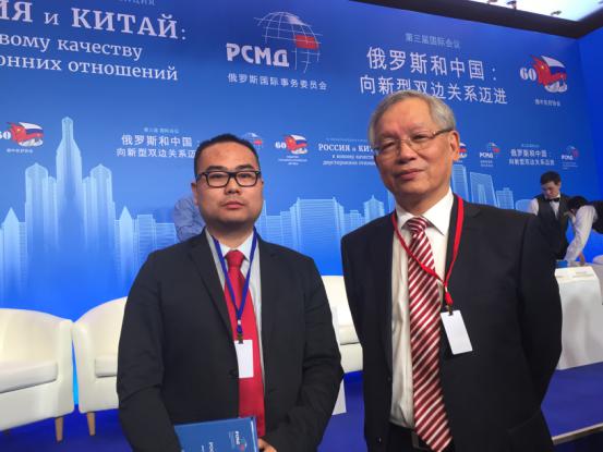 7德和衡莫斯科律所执行主任卢森通与上海社会科学院院长合影.jpg